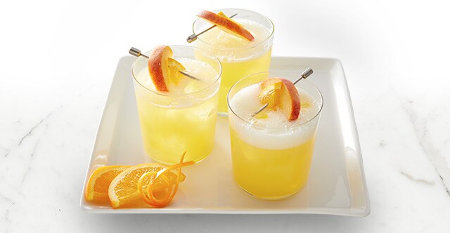 https://www.ralphs.com/content/v2/binary/image/blog/diy/mimosa-bar/imageset-mimosa_bar_fuzzy_navel_mimosa_espot_2023--4888112_p2w2_2023_dx_content_p2w4_springcrops_marketing-review_version-2_inlinehro_fuzzy-navel-mimosa_640x332.jpg