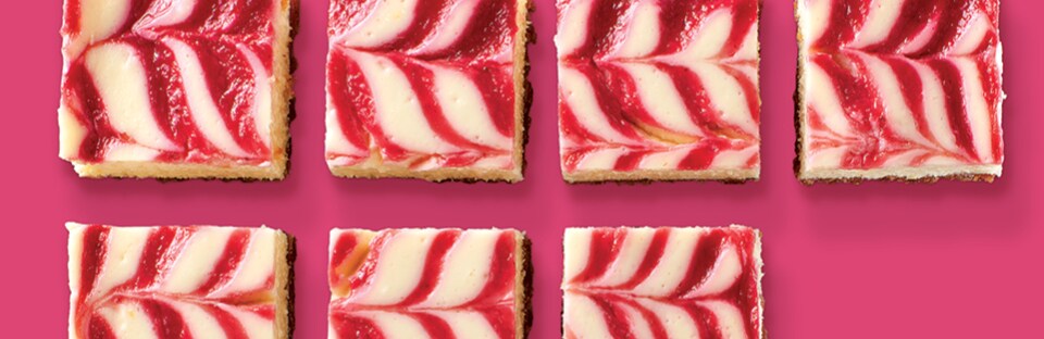 Lemon Cheesecake Bars with Raspberry Swirl