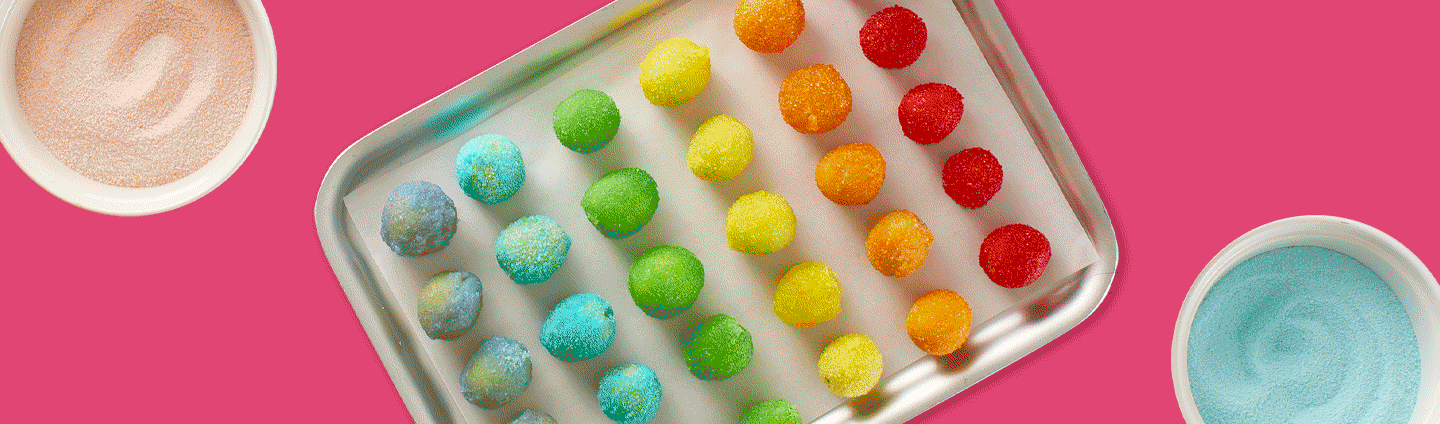 Rainbow colored Candied Grapes on Sheet Tray