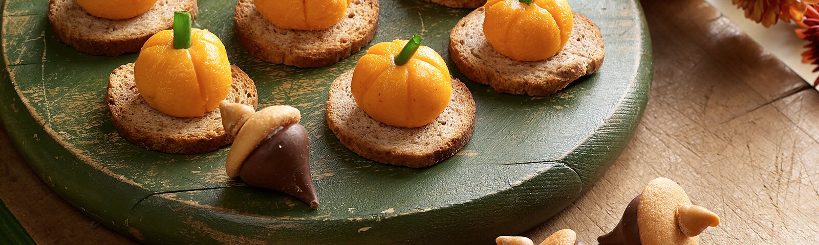 Chocolate and pumpkin spice kiss candies shaped as acorns Chocolate and pumpkin spice kiss candies shaped as acorns