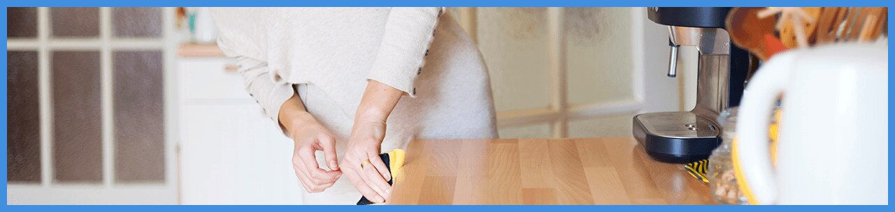 Cleaning counters with sponge